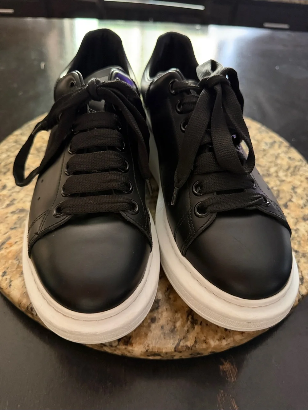 Alexander McQueen Women’s Oversized Black Leather Sneakers with White Platform